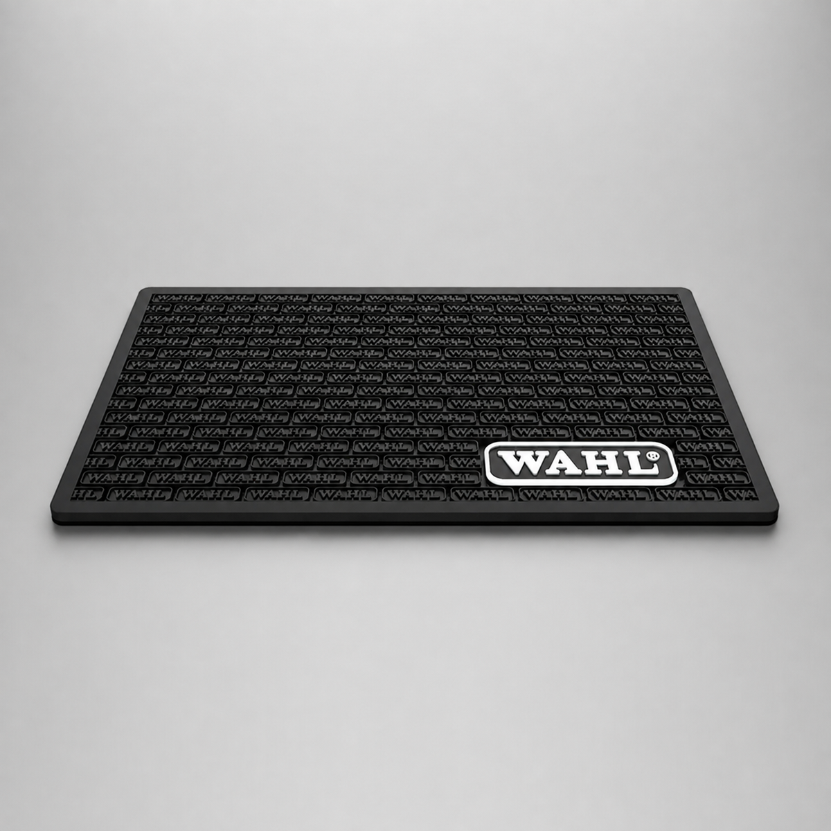 Alfombrilla antideslizante Wahl para herramientas de barbería 30 x 45 cm color negro
