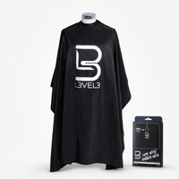 Capa de corte profesional con cuello de caucho L3VEL3 color negro