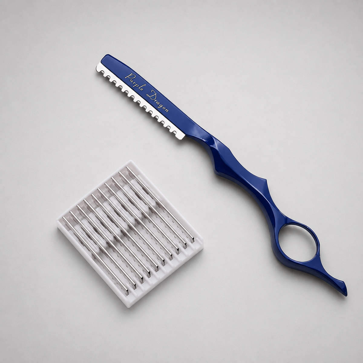 Navaja texturizadora para barbero profesional en color azul metálico con recambios