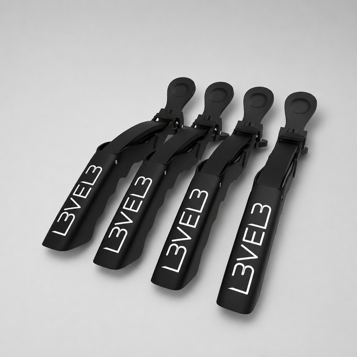Juego de pinzas separadoras de pelo tipo cocodrilo profesionales L3VEL3 en color negro de 10,7 cm